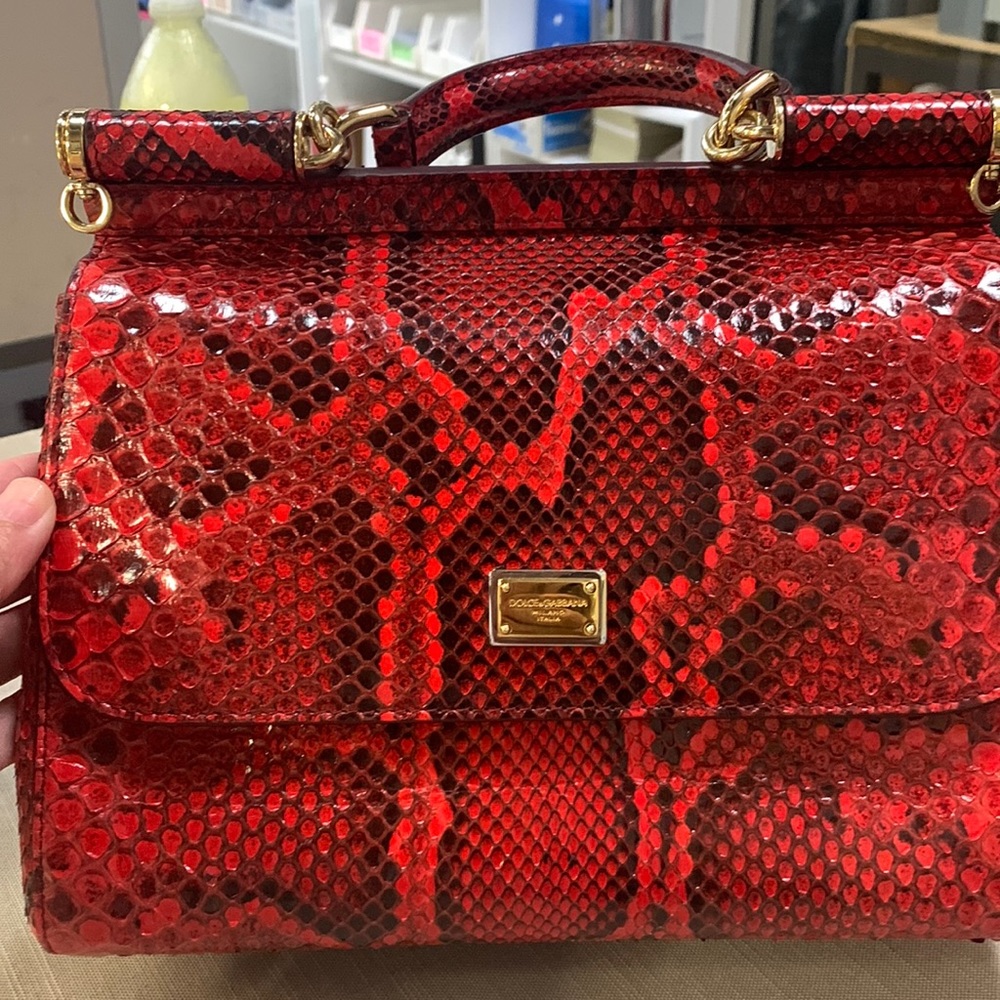 Gently used Dolce & Gabbana red medium Sicily Python Top Handle